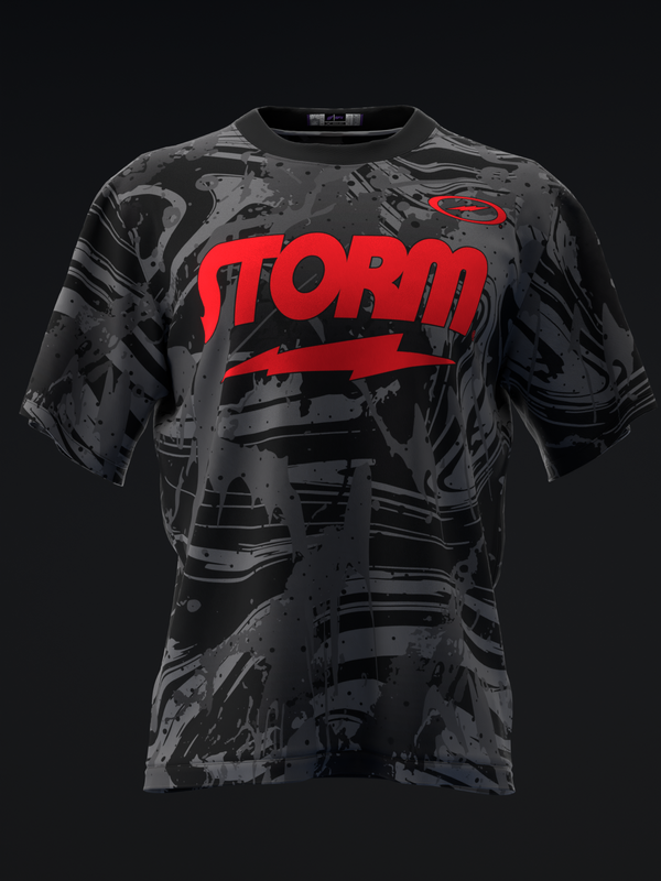 Black bowling jersey with red Storm text and abstract splatter pattern design, front view