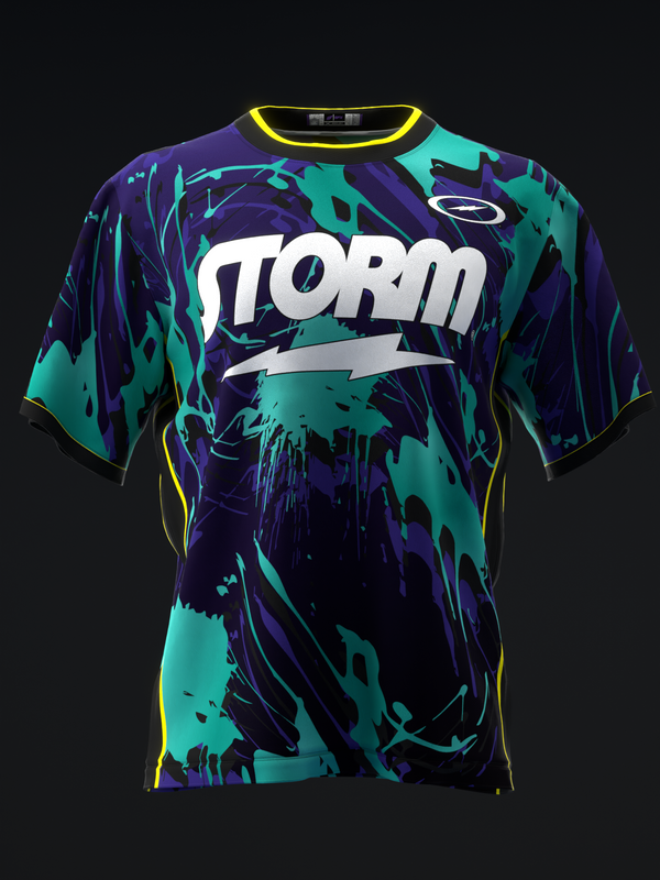 Front view of bowling jersey with purple, teal, and black paint splatter pattern and white Storm logo with lightning bolt graphic
