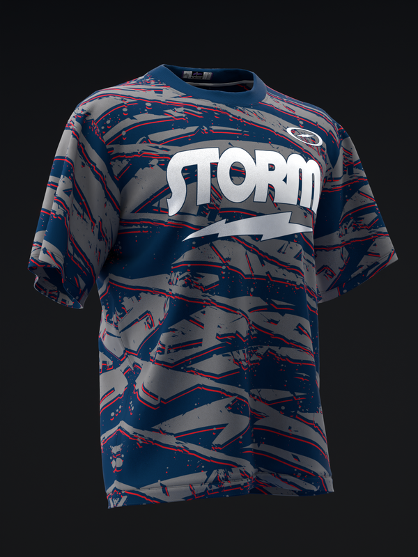 Front view of blue bowling jersey with red and gray swirl pattern and white Storm logo