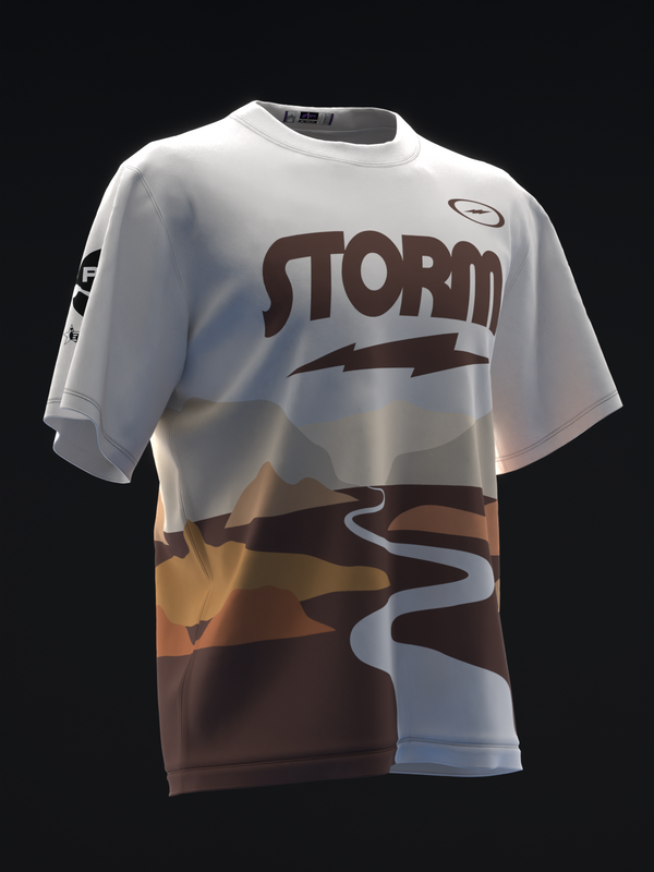 White and brown bowling jersey with STORM text and landscape graphic design, front view