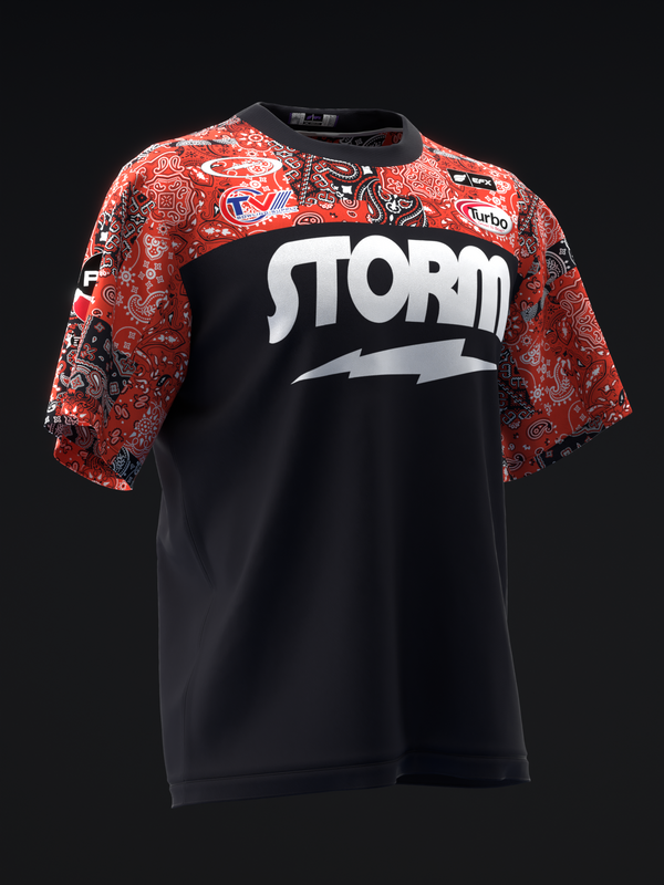 Black bowling jersey with red patterned sleeves and white Storm logo