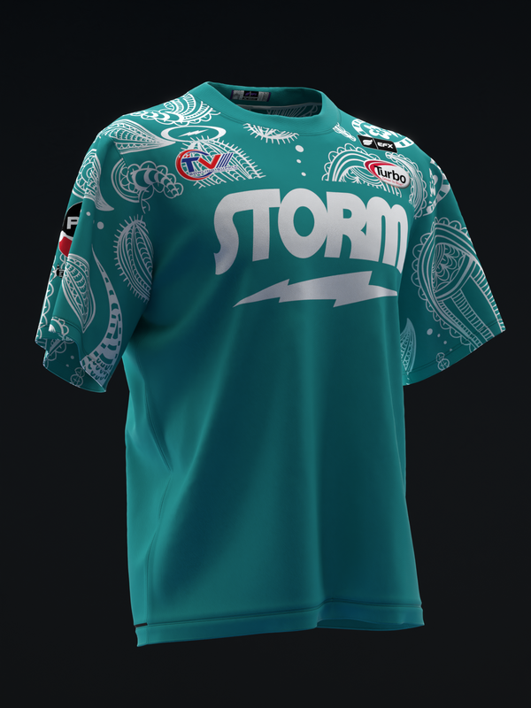 Turquoise bowling jersey with white Storm logo and cactus paisley sleeve pattern