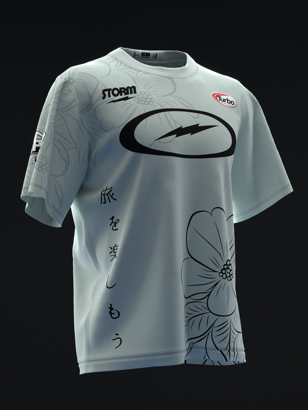 White bowling jersey with Storm and Turbo logos, black oval graphic, floral design, and Asian characters