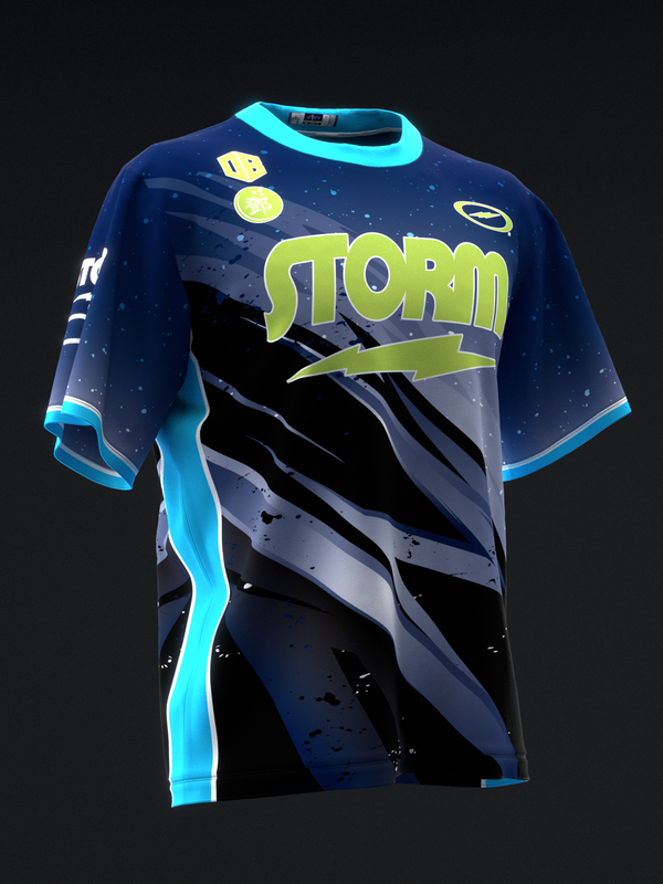 Navy bowling jersey with lime Storm text, black lightning graphic, and cyan trim