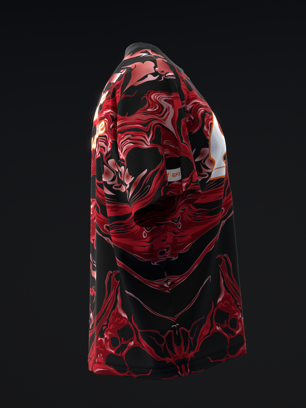 Black bowling jersey with red and white abstract swirl pattern, side view