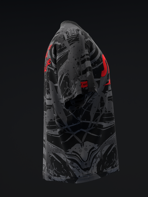 Black bowling jersey with gray abstract geometric pattern and red accents, side view