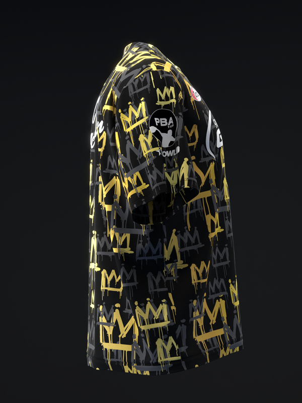 Black bowling jersey with gold crown pattern and PBA logo, three-quarter view