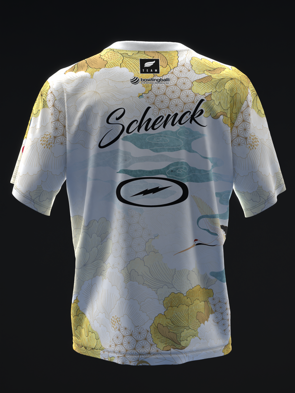 White bowling jersey with yellow floral and crane pattern throughout, front view