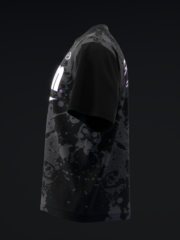 Black bowling jersey with abstract splatter pattern and white accent details, front view