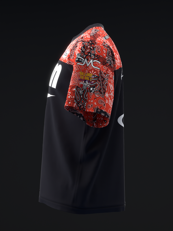 Black bowling jersey with red patterned shoulder panel and white accents, side view