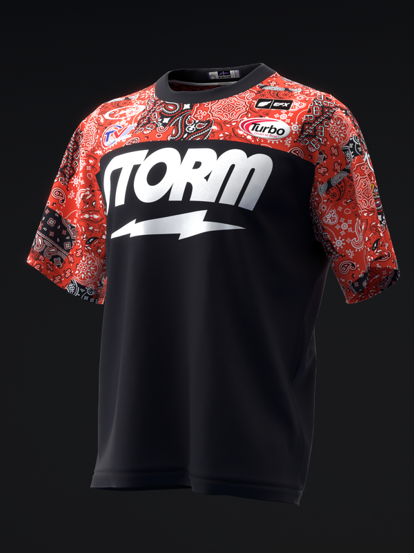 Black bowling jersey with red patterned sleeves and white Storm logo front