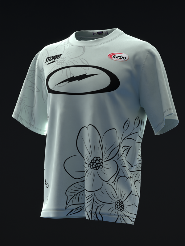 White bowling jersey with black floral design and Turbo logo, front view
