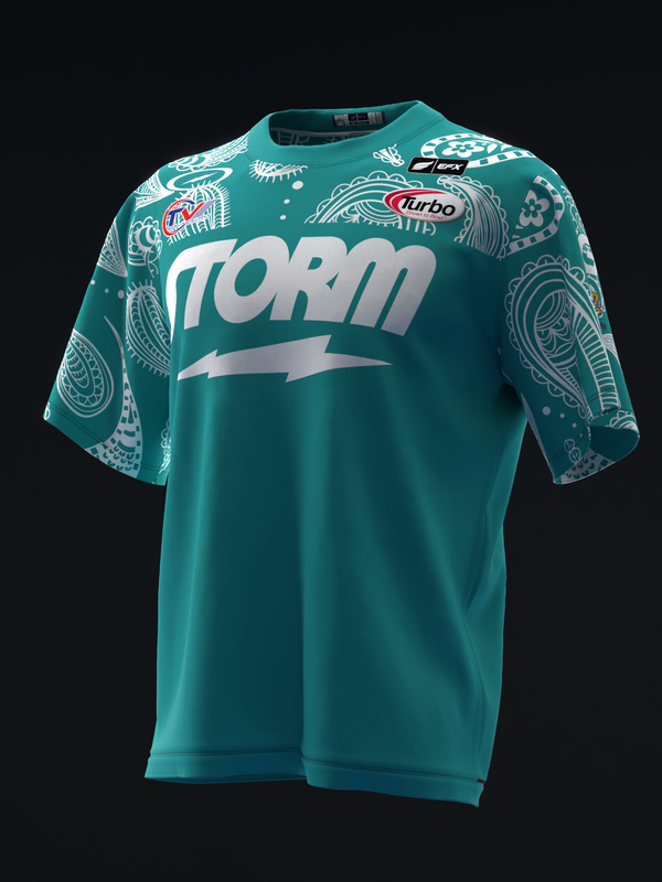 Teal bowling jersey with white Storm logo and paisley pattern on sleeves
