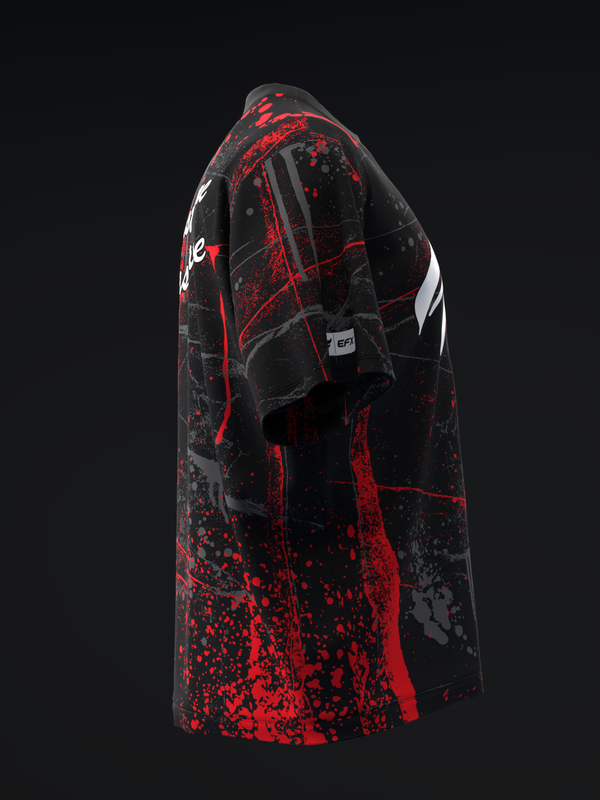 Black bowling jersey with red splatter pattern and white accents, side view