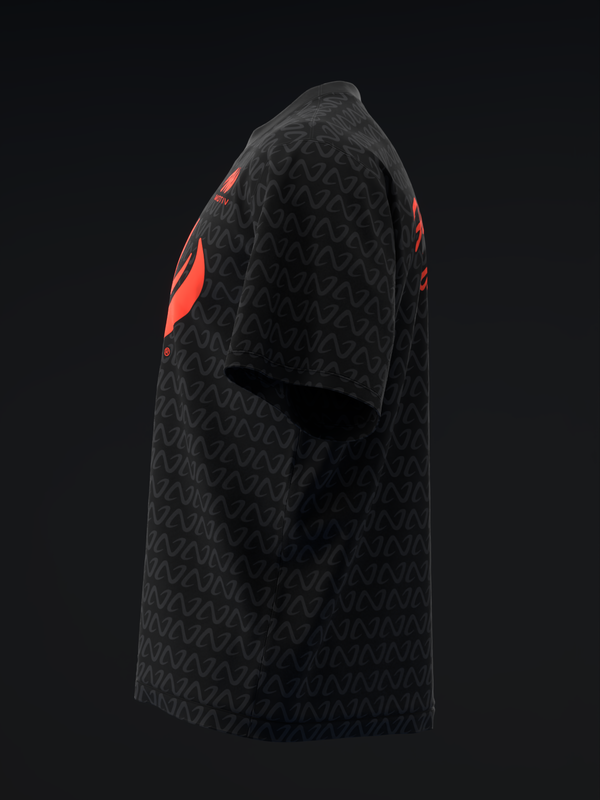 Black bowling jersey with red accent panels and geometric pattern, side view