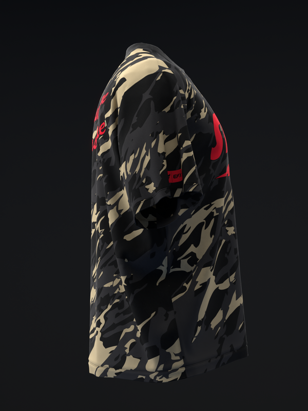 Black bowling jersey with tan and red camouflage pattern, side view