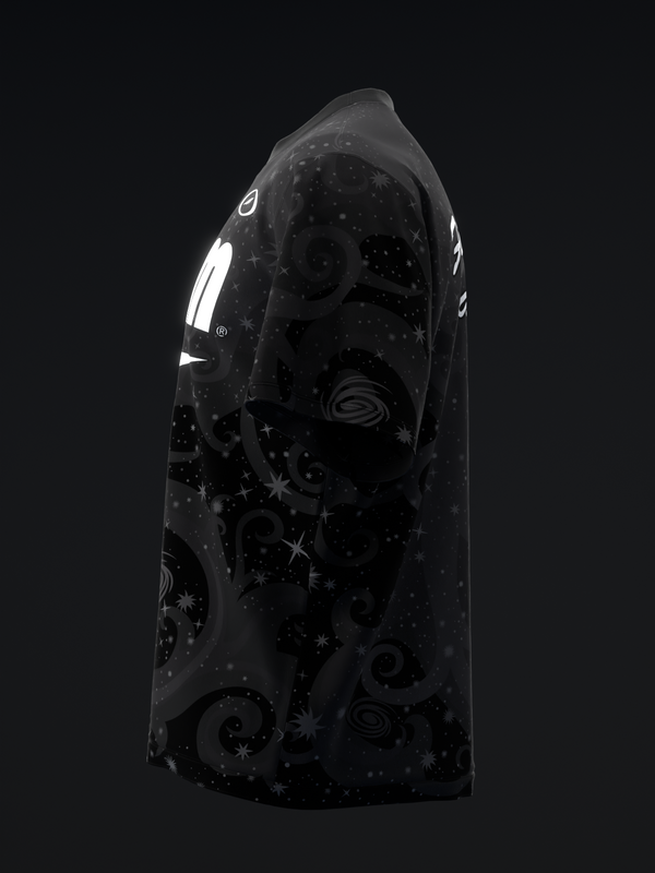 Black bowling jersey with white stars and swirls design, side view