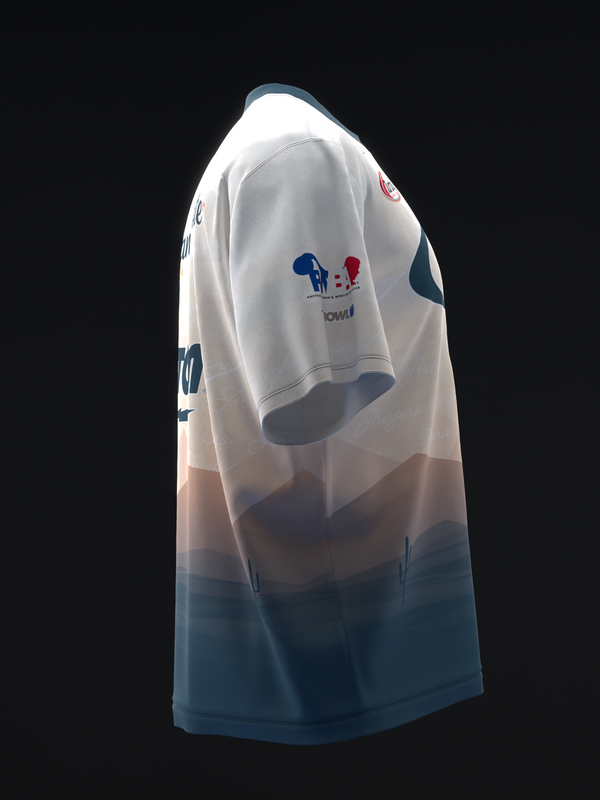 White bowling jersey with blue and red graphic on chest, ombre fade to blue hem