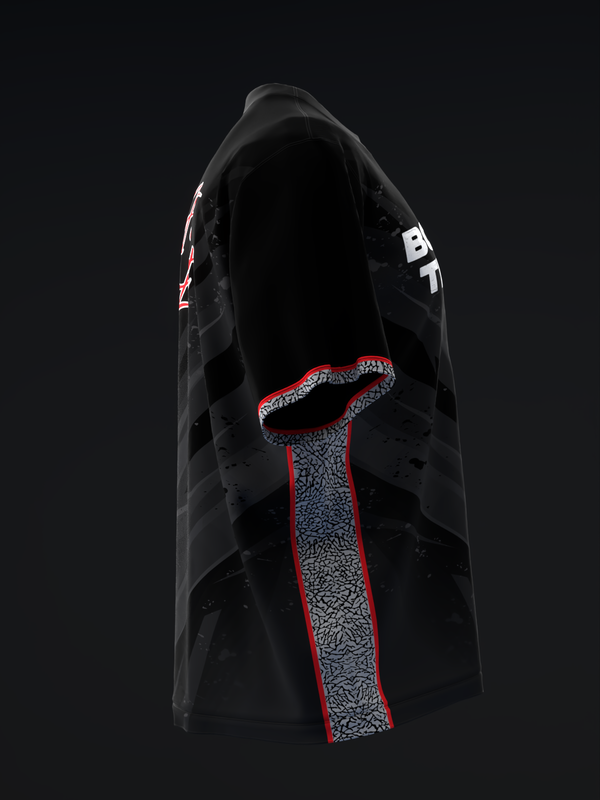 Black bowling jersey with red and gray textured center stripe detail, front view