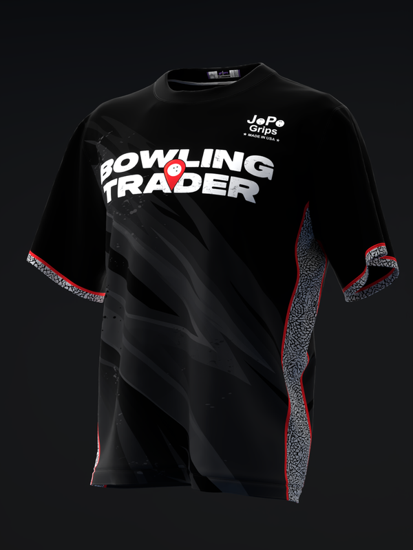 Black bowling jersey with white Bowling Trader text and red side panels with textured detail