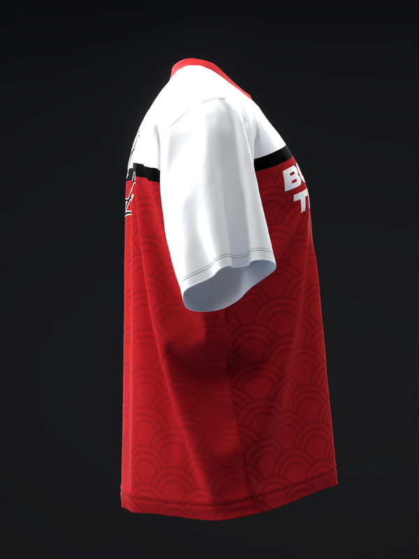 Red and white bowling jersey with black shoulder stripes, side view