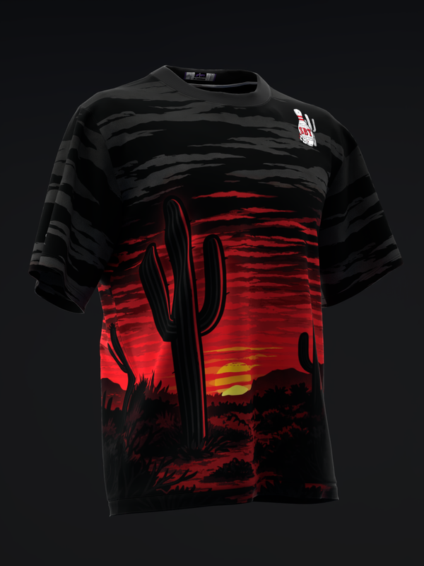 Black bowling jersey with desert sunset graphic in red and gold tones, front view