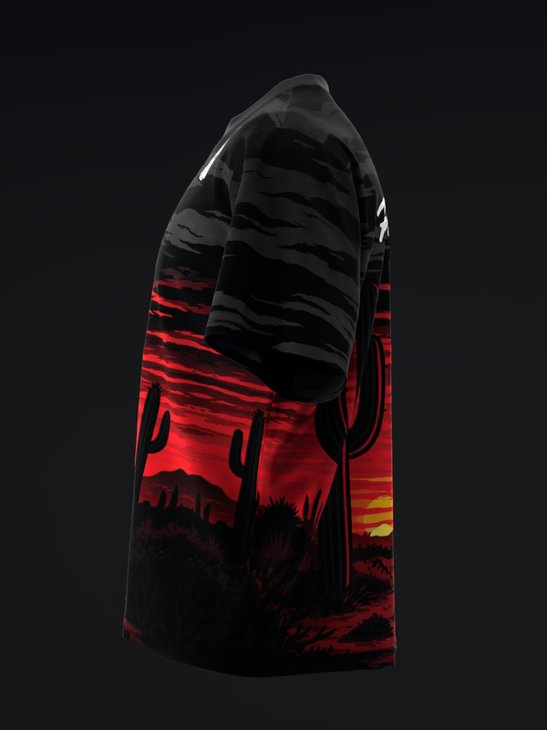 Black bowling jersey with red desert sunset graphic and horizontal stripes, side view