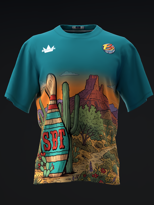 Teal bowling jersey with desert landscape graphic and colorful bowling pin design
