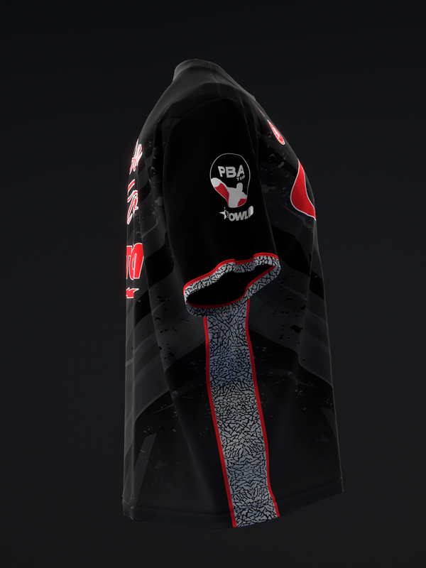 Black bowling jersey with red accents and cement texture design detail