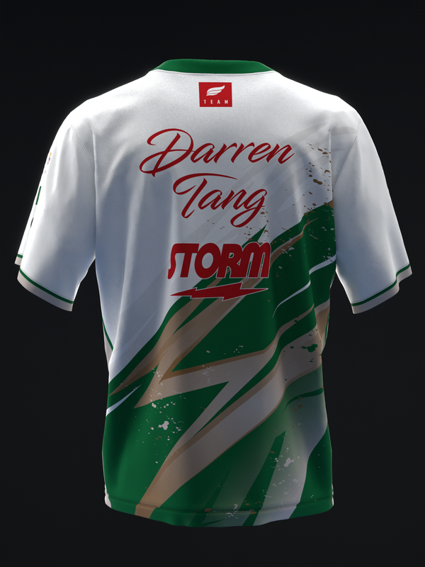 Back view of white and green bowling jersey with red cursive text and logo design