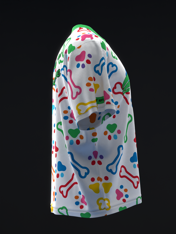 White bowling jersey with colorful dog bones, hearts, and paw prints throughout, side view