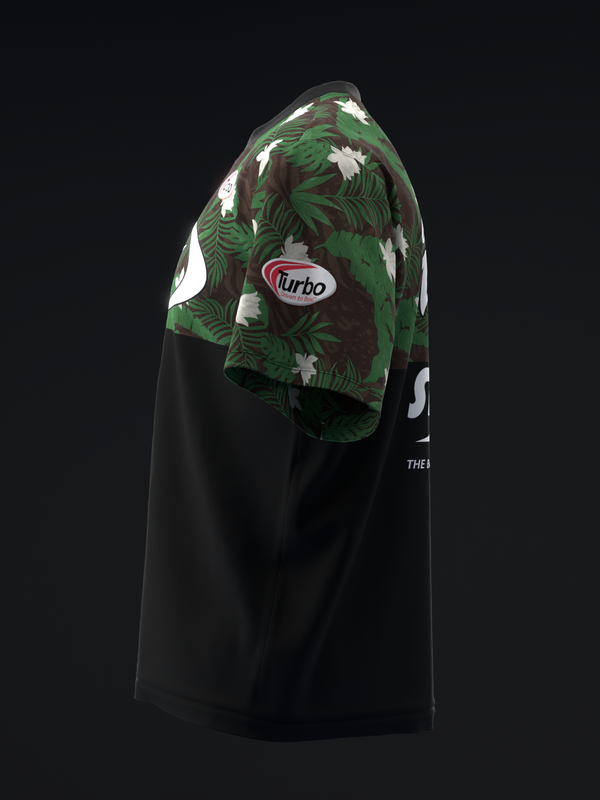 Black bowling jersey with tropical palm leaf pattern on green shoulder yoke
