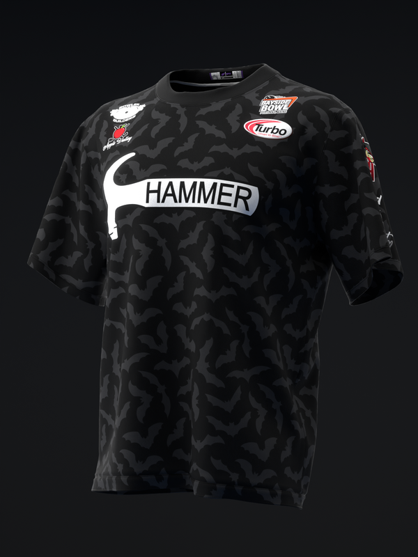 Black bowling jersey with bat pattern and Hammer logo, front view