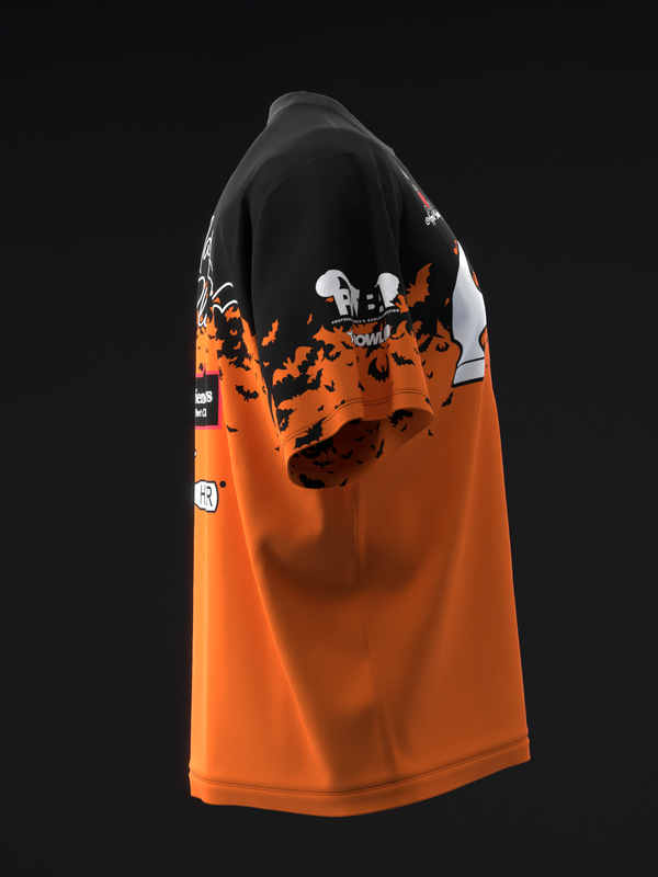 Black and orange bowling jersey with bat graphic design, side view