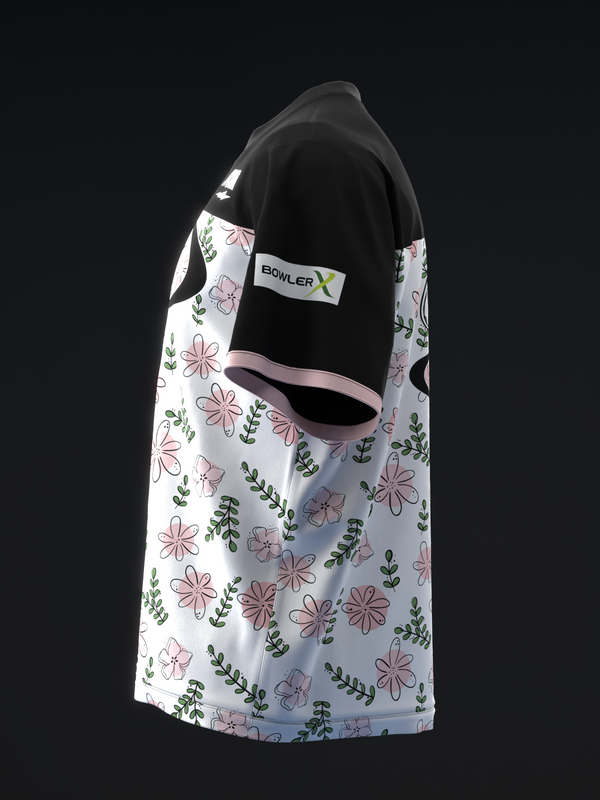 White bowling jersey with pink flowers and green leaves pattern, black back