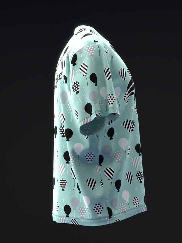 Teal bowling jersey with black and white balloon pattern, side view