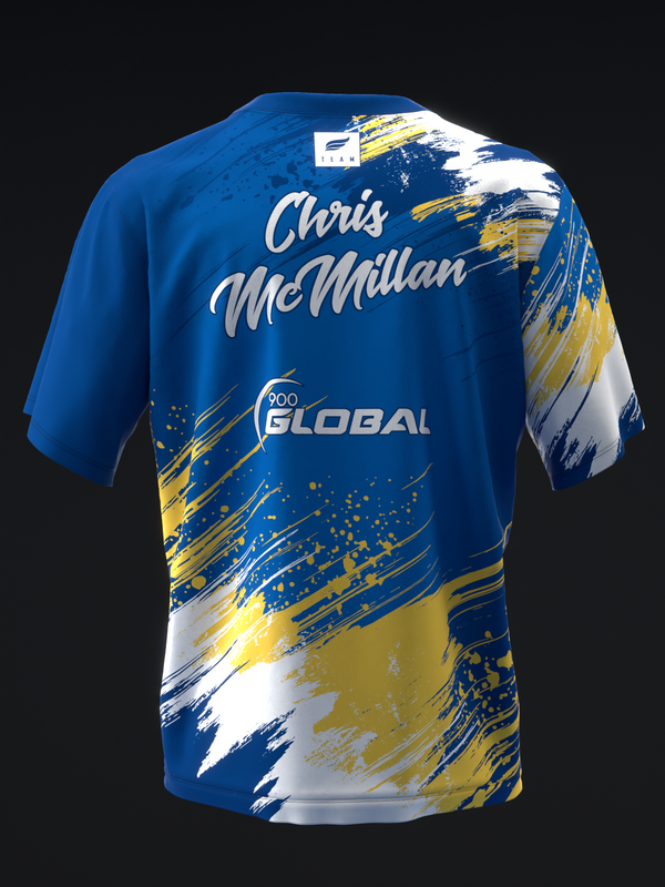 Blue bowling jersey with white and gold paint splatter design and Chris McMillan name