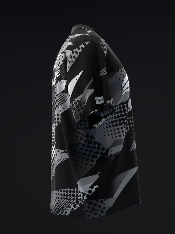 Black bowling jersey with gray and white abstract geometric pattern, side view