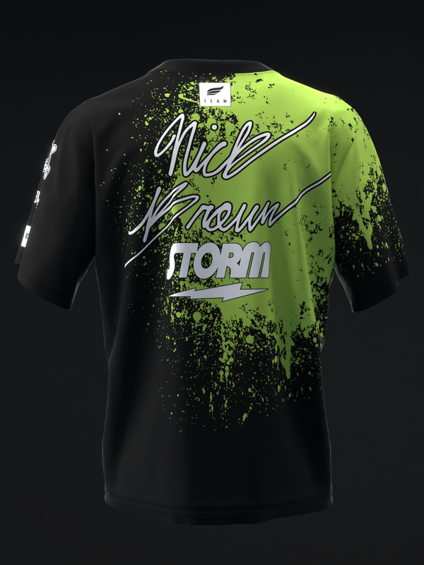 Black bowling jersey with lime green splatter design and white script text