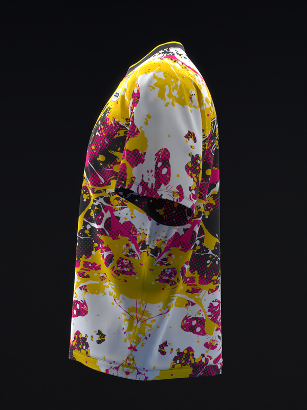 White bowling jersey with yellow and magenta splatter paint design, side view