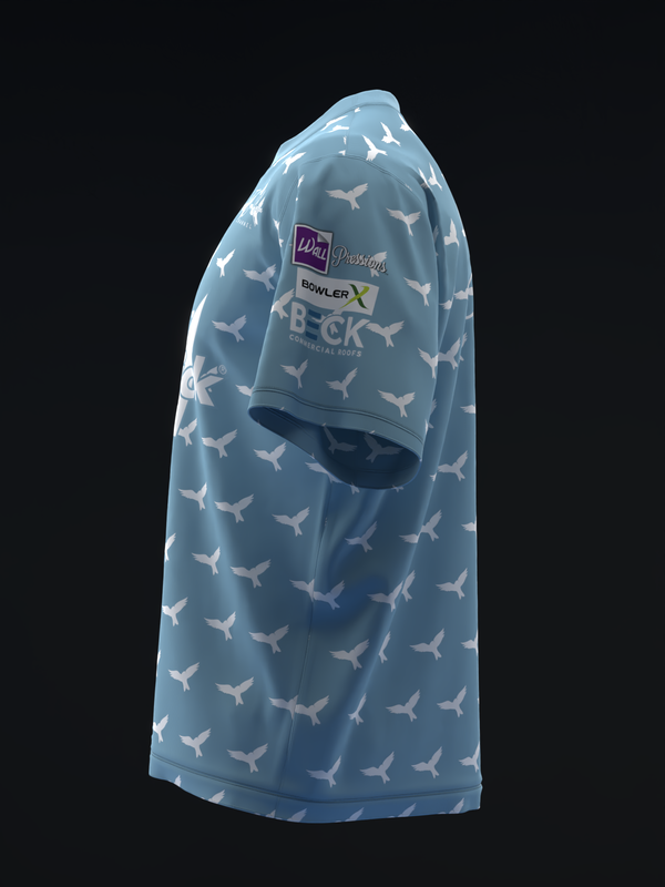 Light blue bowling jersey with white bird pattern, side view