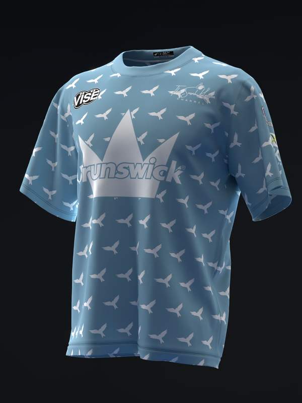 Light blue bowling jersey with white bird pattern and Brunswick logo