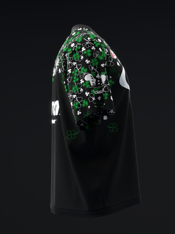 Black bowling jersey with green and white clover pattern on back yoke area