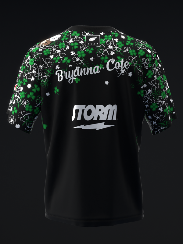 Black bowling jersey with green and white floral clover pattern on sleeves
