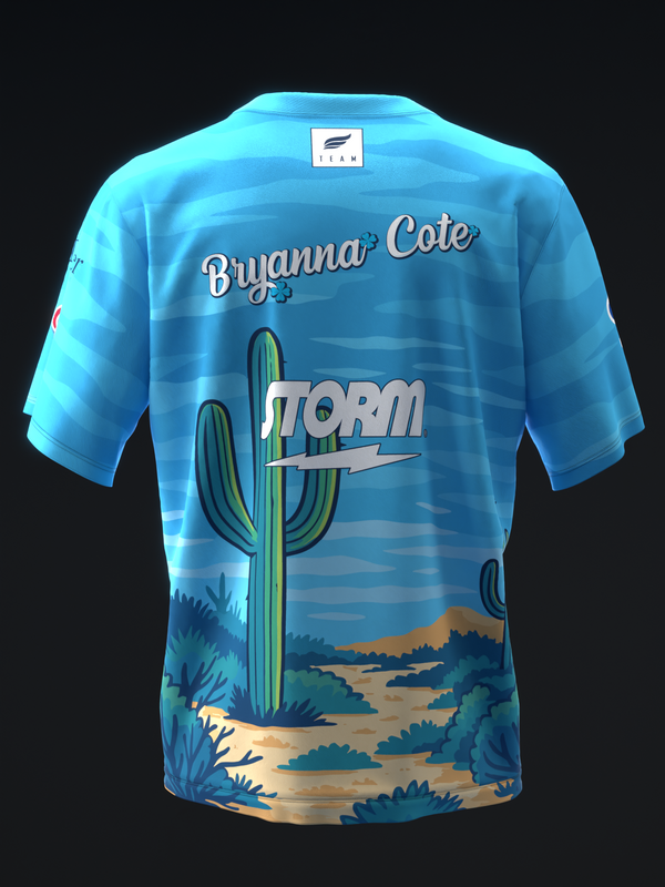Bright blue bowling jersey back with desert cactus and sunset landscape graphic