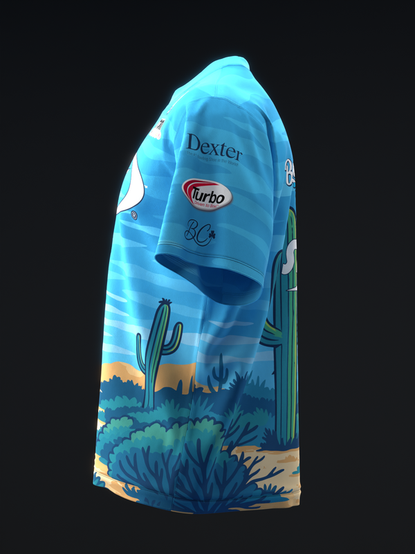 Bright blue bowling jersey with desert sunset graphic and cactus design