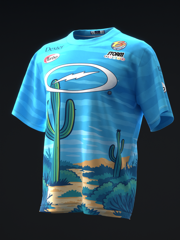 Bright blue bowling jersey with desert sunset and cactus landscape graphic