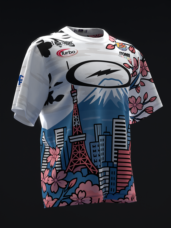 White bowling jersey with Tokyo cityscape, pink flowers, and brand logos front view
