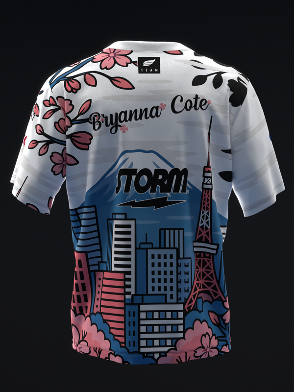 White bowling jersey with pink flowers, blue cityscape, and Storm logo graphic