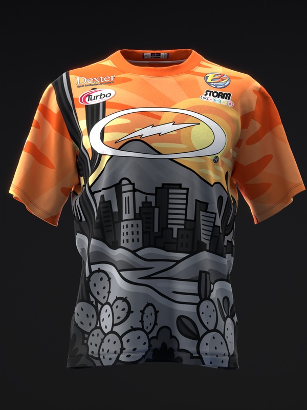 Orange bowling jersey with desert landscape and cityscape graphic design on front